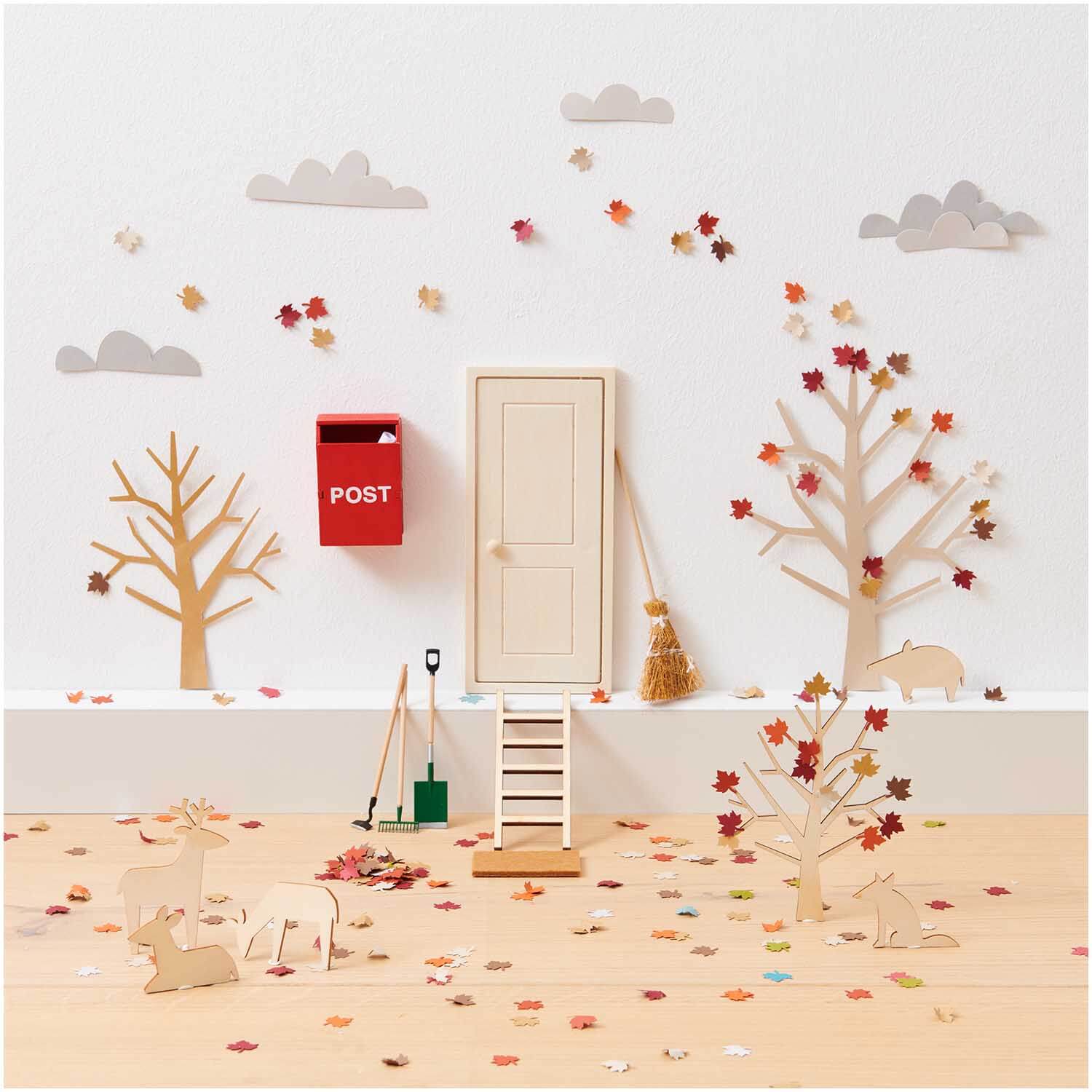 Miniatur Briefkasten mit Zeitung