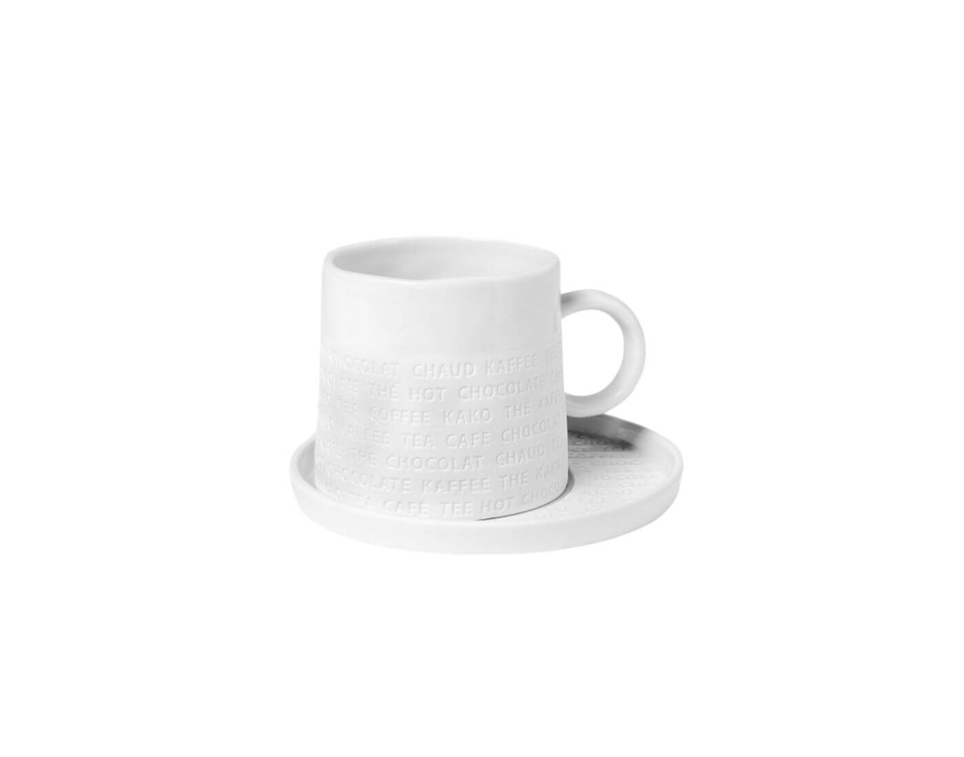 Raumpoesie genießen. Tasse mit Untersetzer