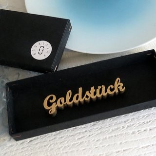 NOGALLERY Goldstück - grau